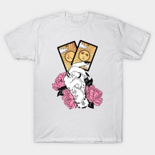 Witch hand hold two tarot cards The Moon and The Sun T-Shirt